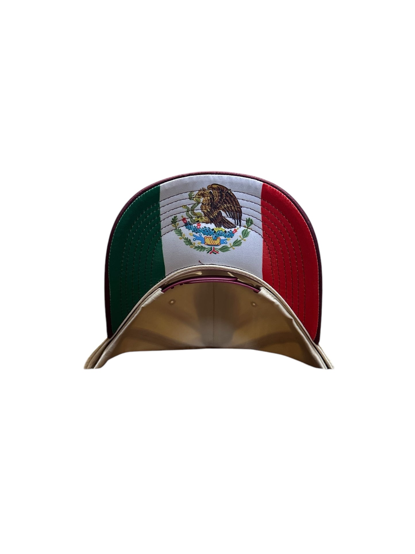 Maroon and cream mexico flag under brim