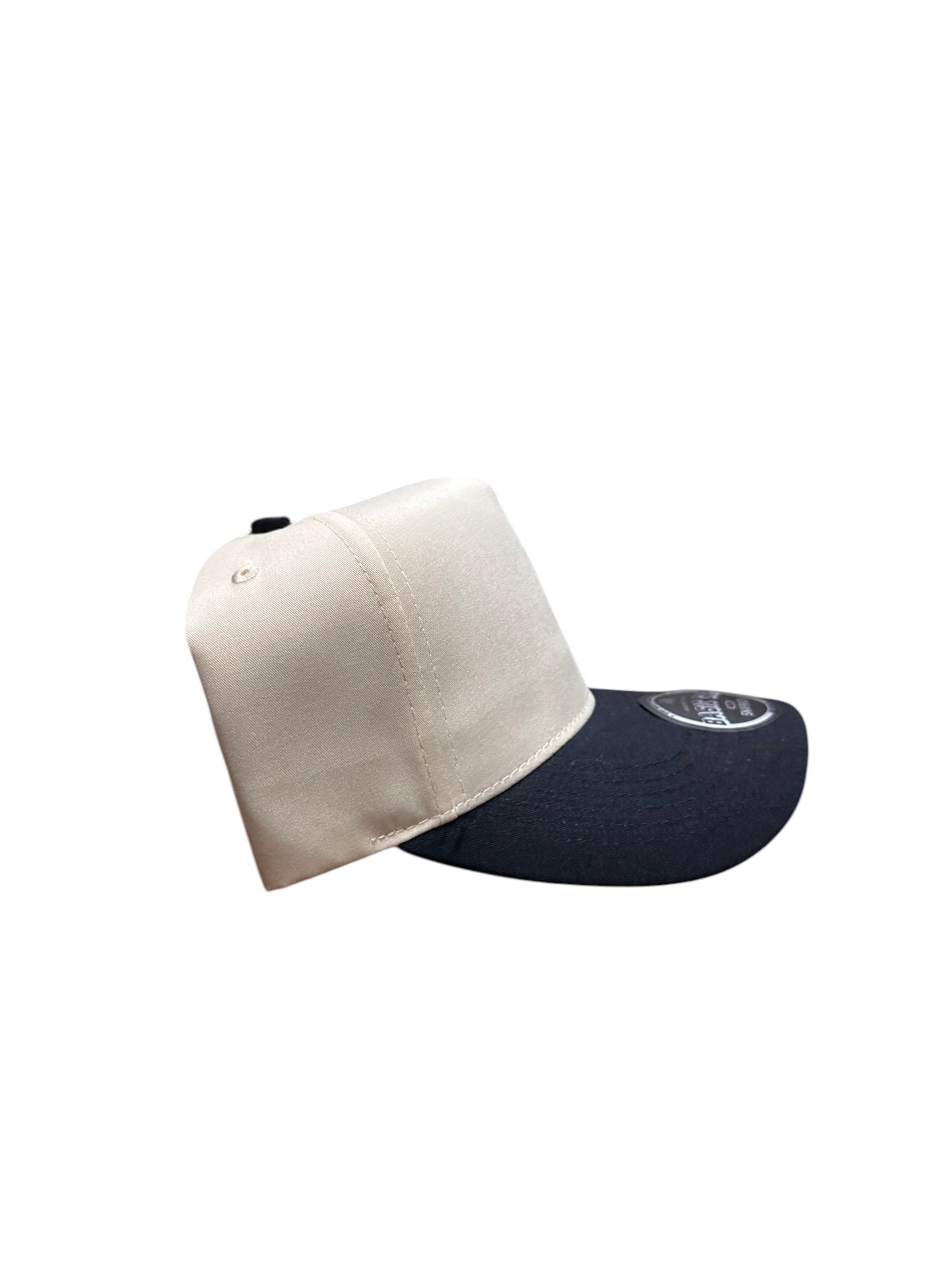 Black and cream Mexico flag under brim